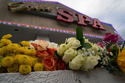 Flowers left in honor of the Atlanta shooting victims.