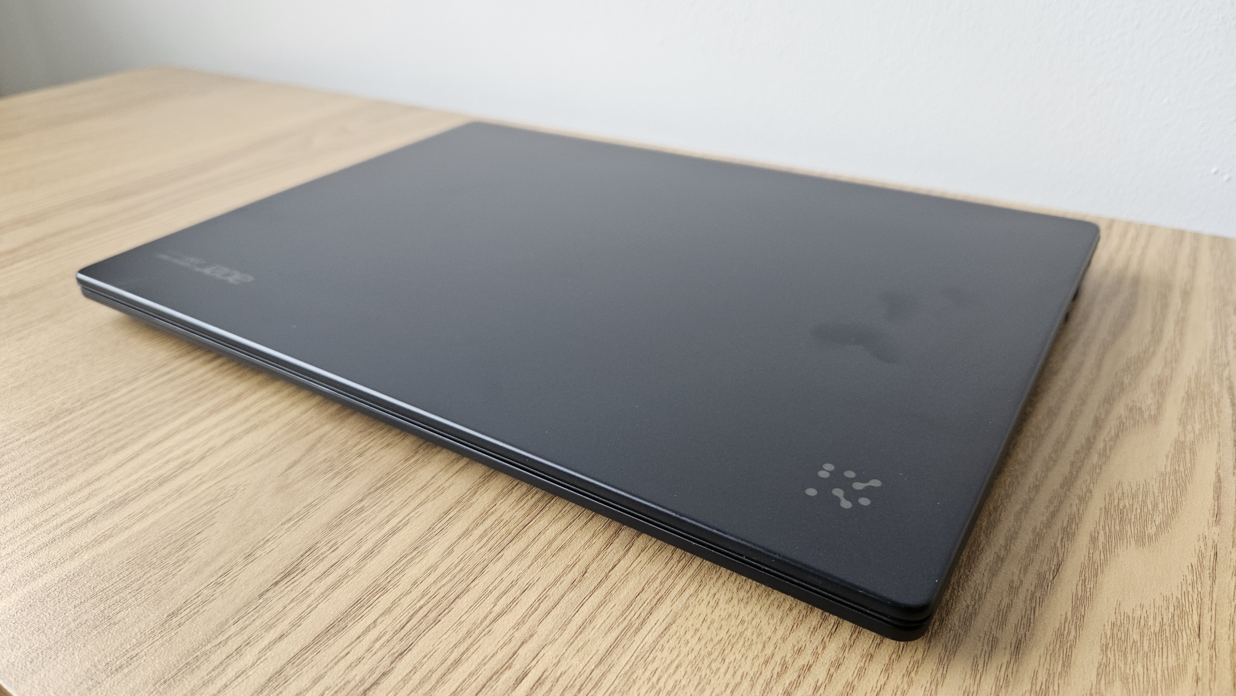 The Acer TravelMate P6 14 AI on a desk