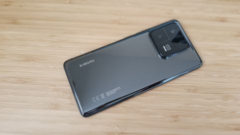 The rear of a Xiaomi 13 Pro sitting on a table