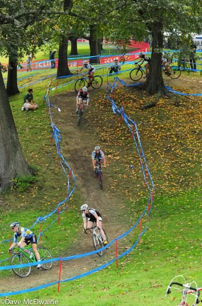 The women's field negotiates a short descent