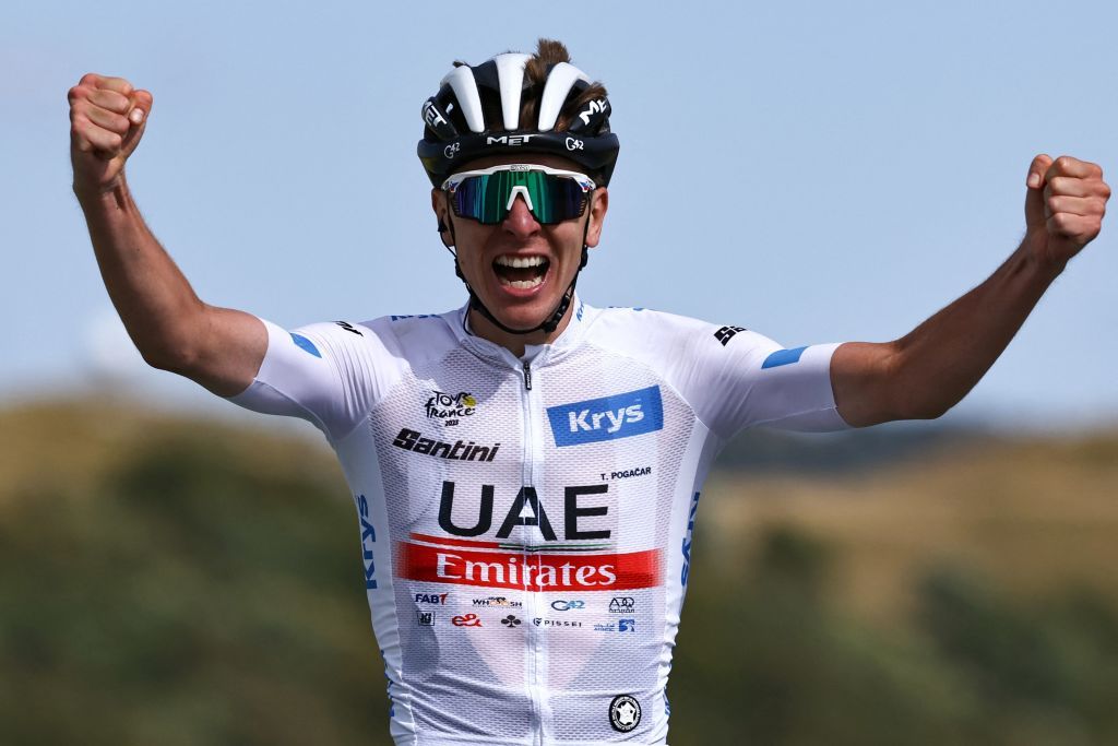 UAE Team Emirates Slovenian rider Tadej Pogacar wearing the best young riders white jersey cycles to the finish line to win the 20th stage of the 110th edition of the Tour de France cycling race 133 km between Belfort and Le Markstein Fellering in Eastern France on July 22 2023 Photo by AnneChristine POUJOULAT AFP Photo by ANNECHRISTINE POUJOULATAFP via Getty Images