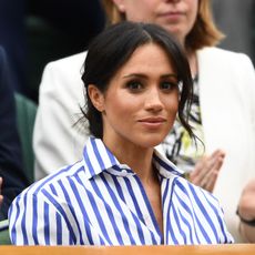 Meghan, Duchess of Sussex attends day twelve of the Wimbledon Lawn Tennis Championships at All England Lawn Tennis and Croquet Club on July 14, 2018 in London, England