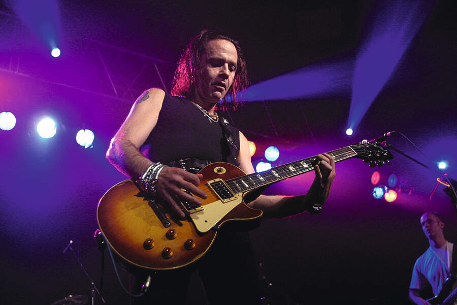 Brian Robertson onstage, 2002