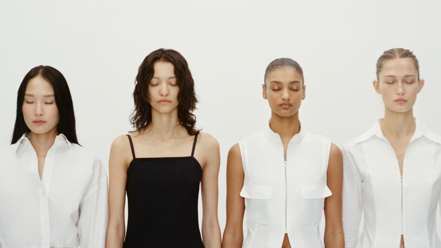 models wearing mango in front of a white wall