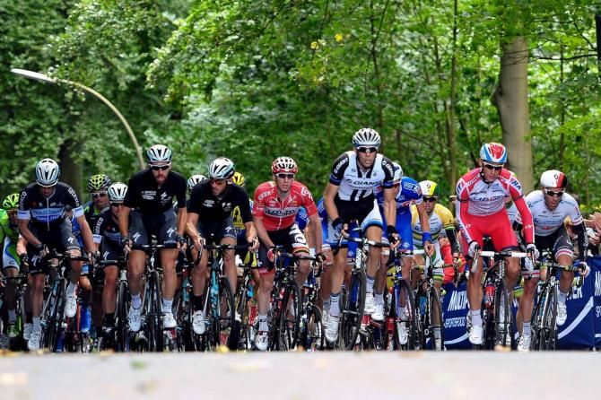 The peloton encounters a small climb