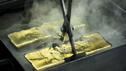 Gold bars being made © Getty images