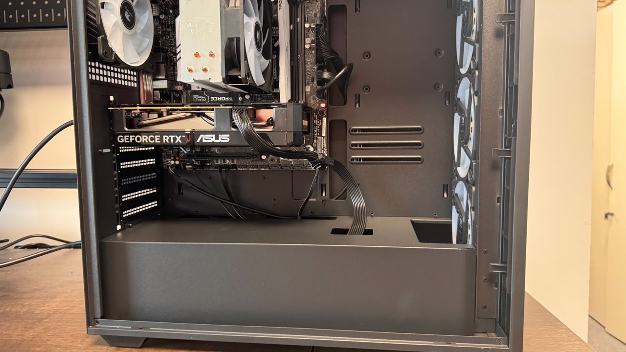 iBuyPower RDY Scale B06 gaming pc on a wooden desk