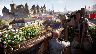 Sniper Elite Resistance review; two people look at a large French castle