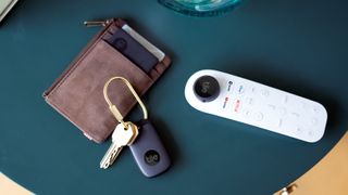 Tile Slim, Pro and Sticker tracking keys, a wallet and a TV remote