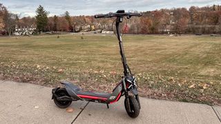 Segway Kickscooter ZT3 Pro parked on sidewalk