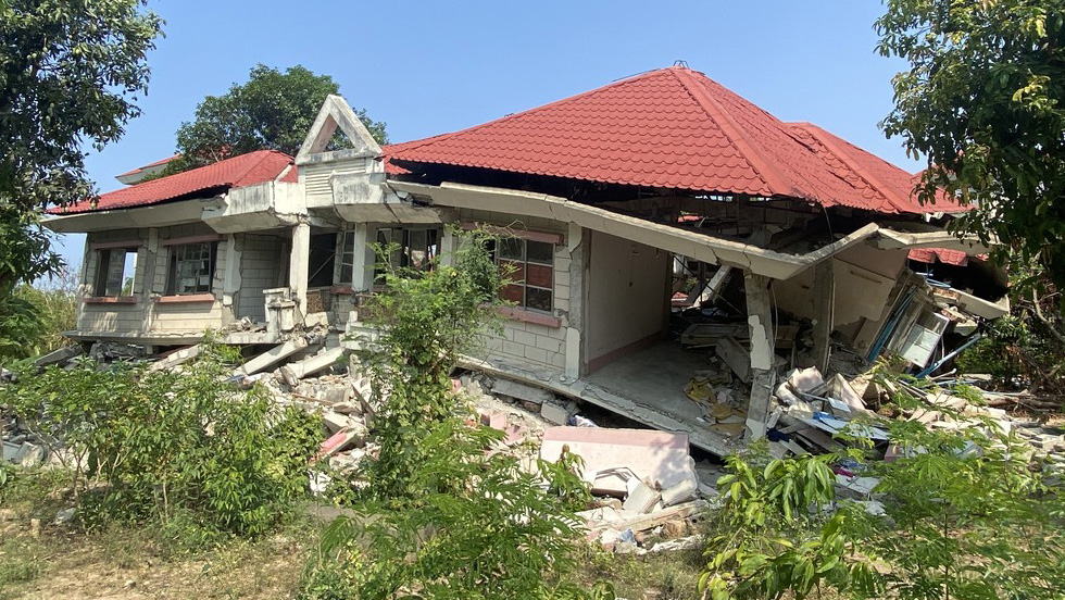 A house is seen split in half due to an earthquake