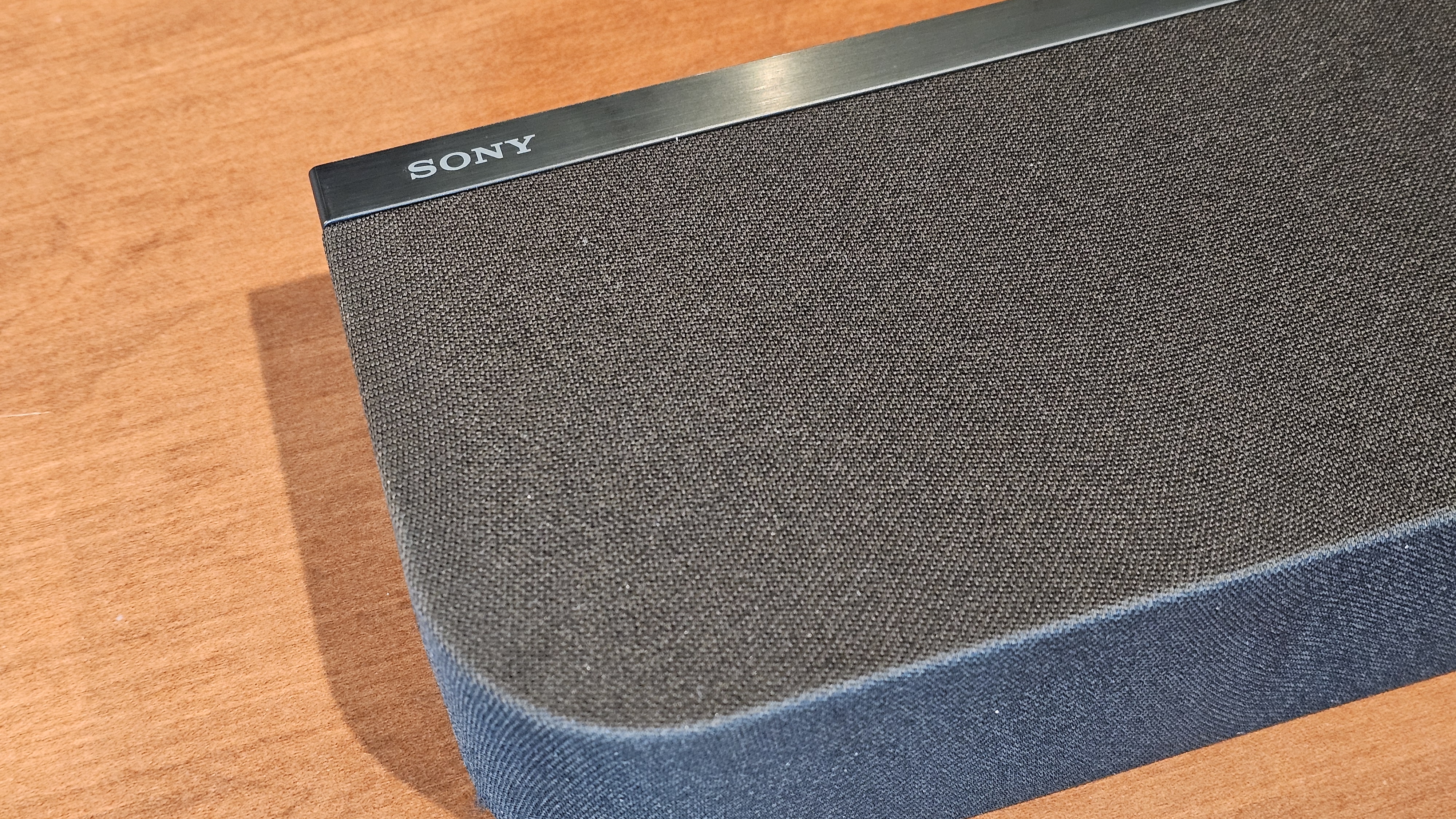 A close up of the Sony Bravia Theater Bar 7 on a wooden surface