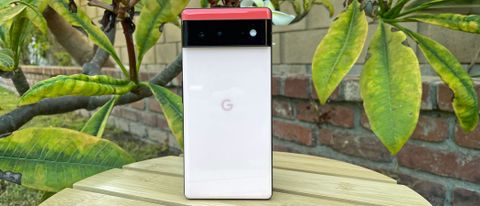 A Google Pixel 6 from the back, stood on a table