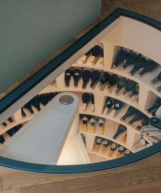 A wine cellar under the kitchen floor in a circular store