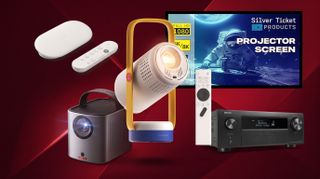 A collection of home theater equipment on a dark red background