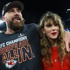 ravis Kelce #87 of the Kansas City Chiefs (L) celebrates with Taylor Swift after defeating the Baltimore Ravens in the AFC Championship Game at M&T Bank Stadium on January 28, 2024 in Baltimore, Maryland.