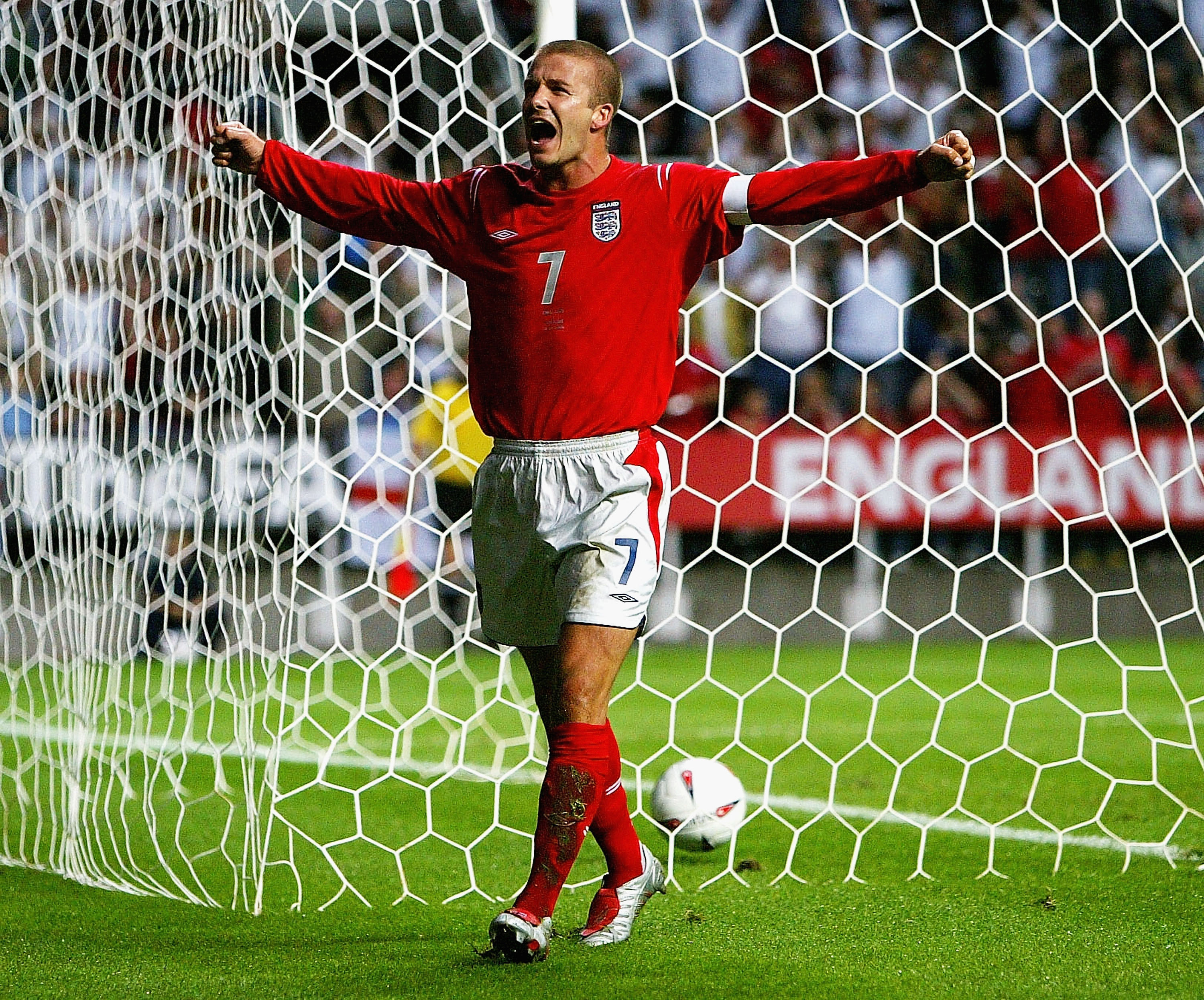David Beckham celebrates after scoring for England against Ukraine in a friendly in August 2004.