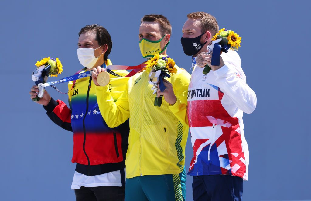 TOKYO JAPAN AUGUST 01 LR Silver Medalist Daniel Dhers of Team Venezuela Gold Medalist Logan Martin of Team Australia and Bronze Medalist Declan Brooks of Team Great Britain pose for a photo on the podium after the Mens Park Final of the BMX Freestyle on day nine of the Tokyo 2020 Olympic Games at Ariake Urban Sports Park on August 01 2021 in Tokyo Japan Photo by Jamie SquireGetty Images