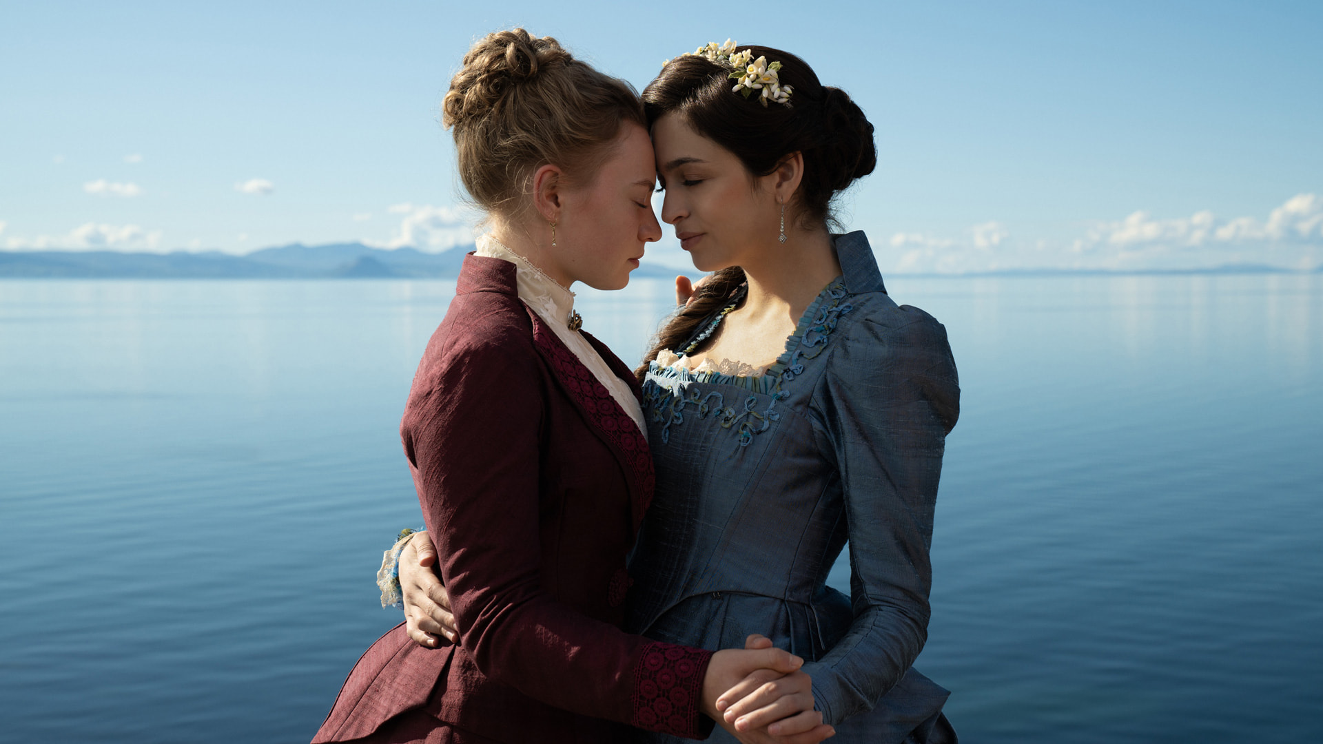 Mia Threapleton and Josie Totah in a scene from The Buccaneers season two