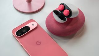 The Peony pink Google Pixel 9 next to the pink Google Pixel Buds Pro 2