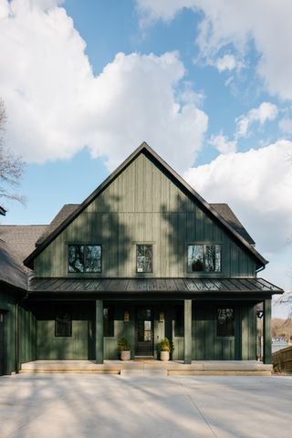 large house with green painted exterior