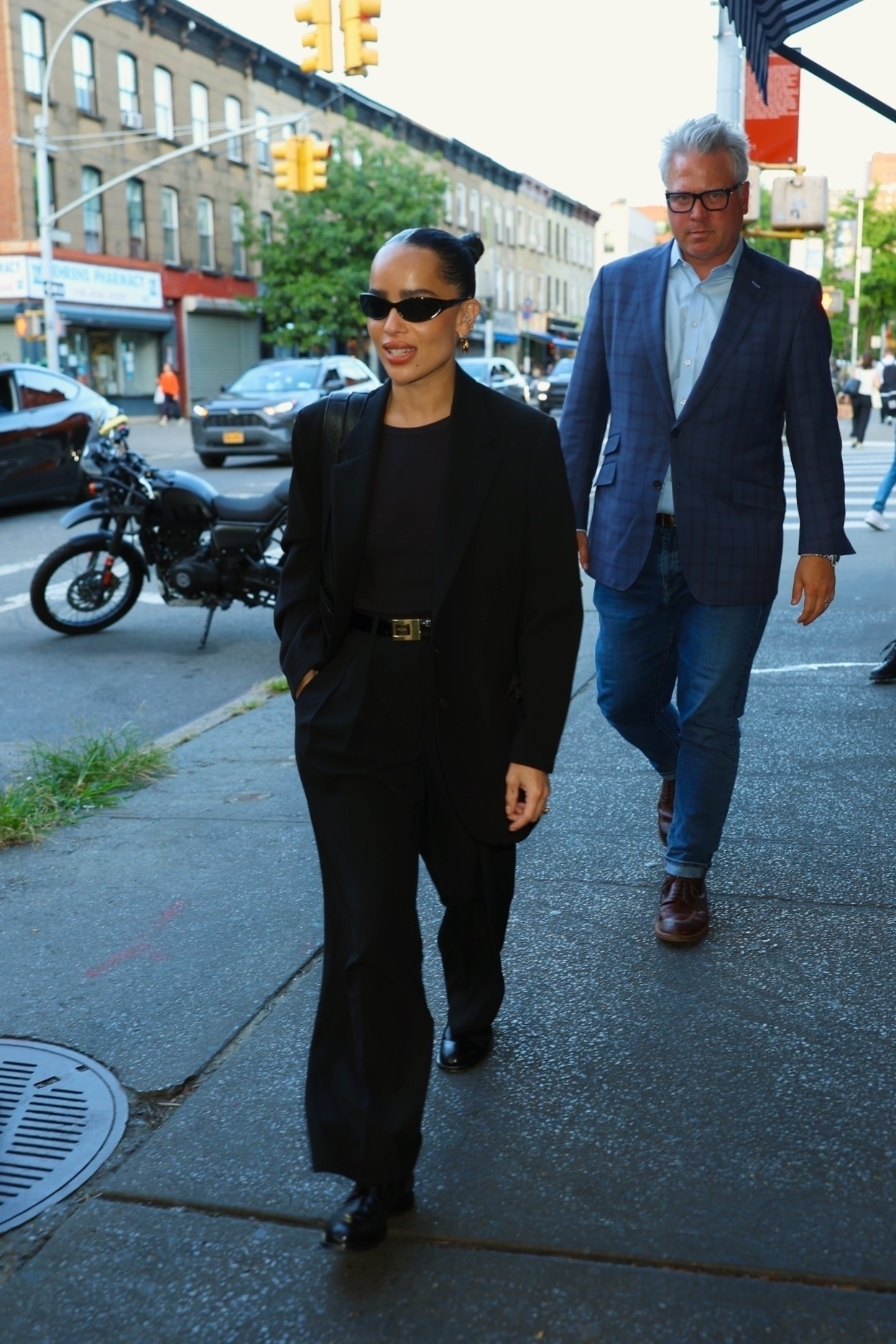 Zoë Kravitz styled wide-leg trousers with a matching black blazer