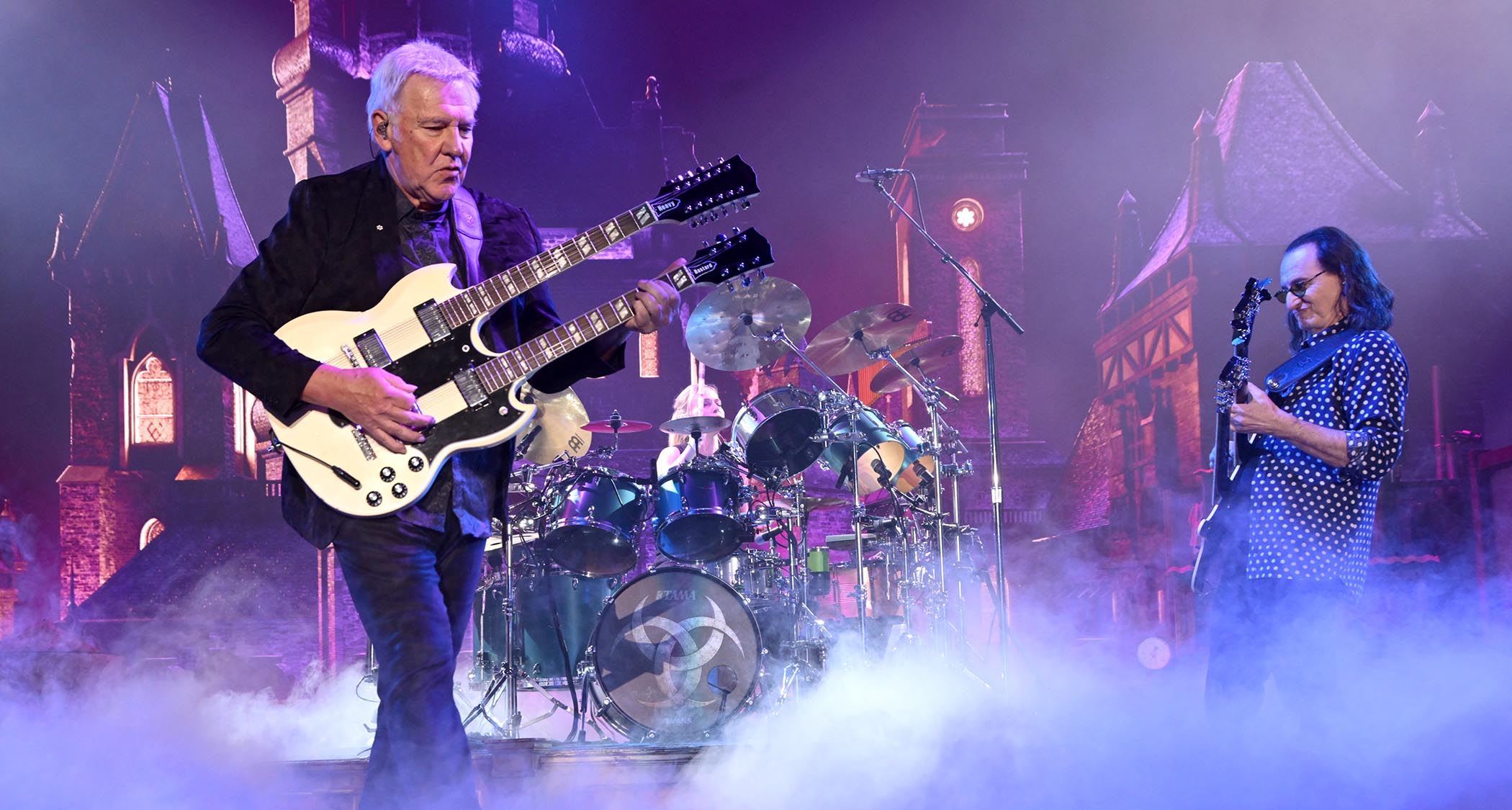 Alex Lifeson and Geddy Lee onstage in 2026.