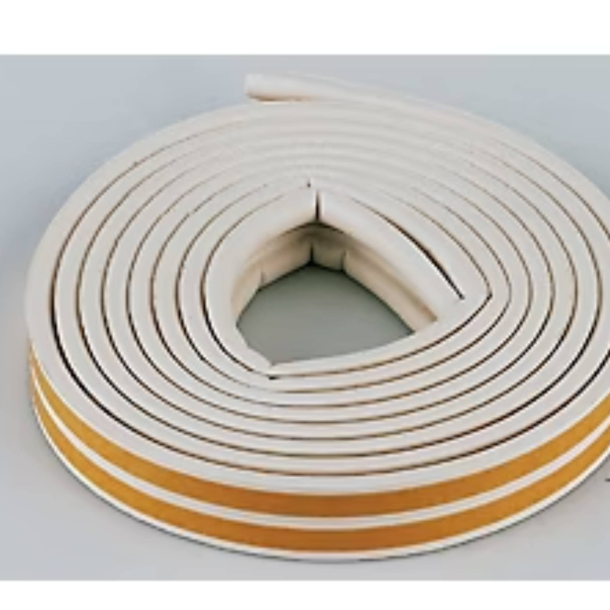 coil of white and yellow draught proofing tape for windows and doors
