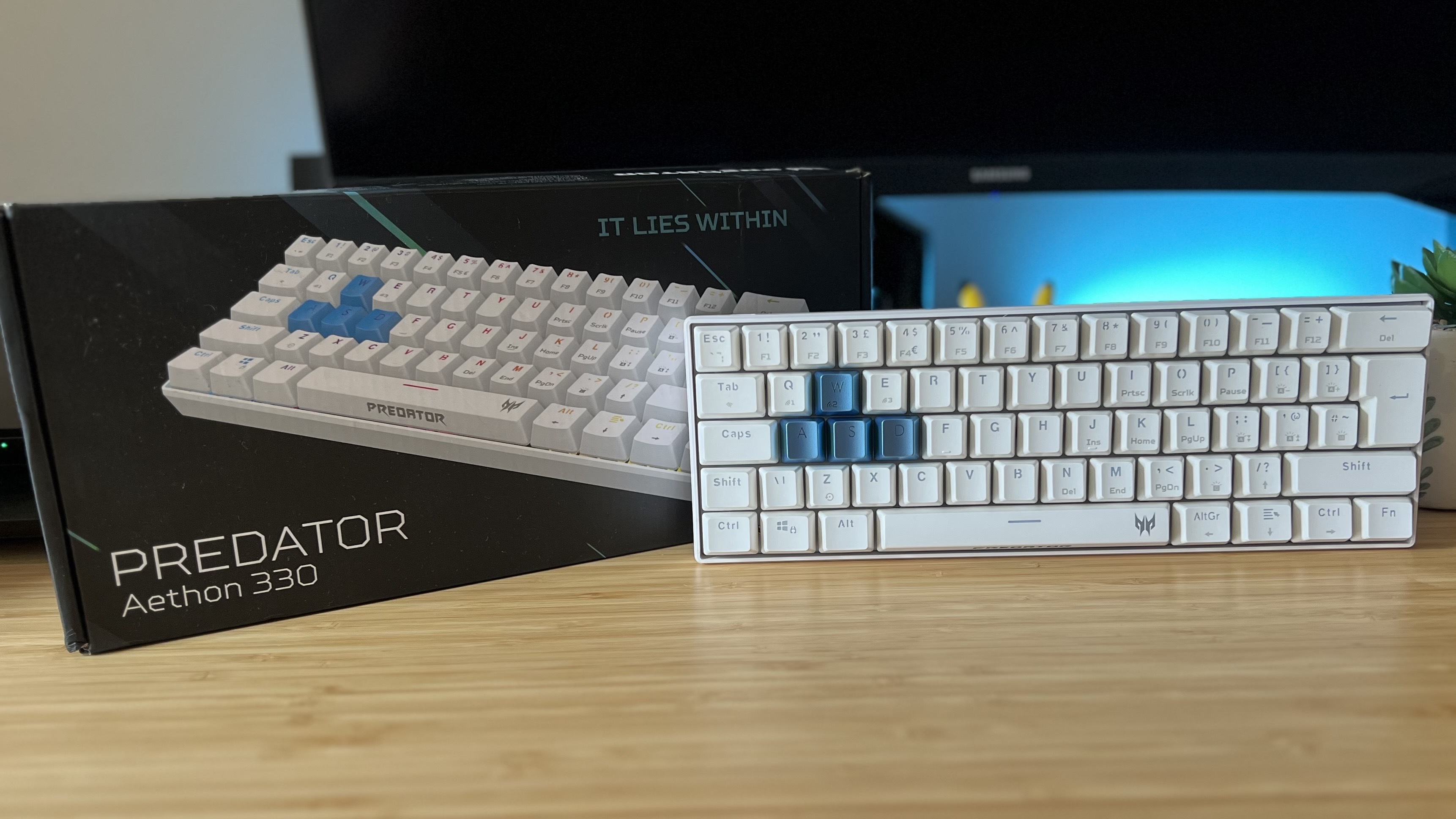 Acer Predator Aethon 330 with packaging on a wooden desk