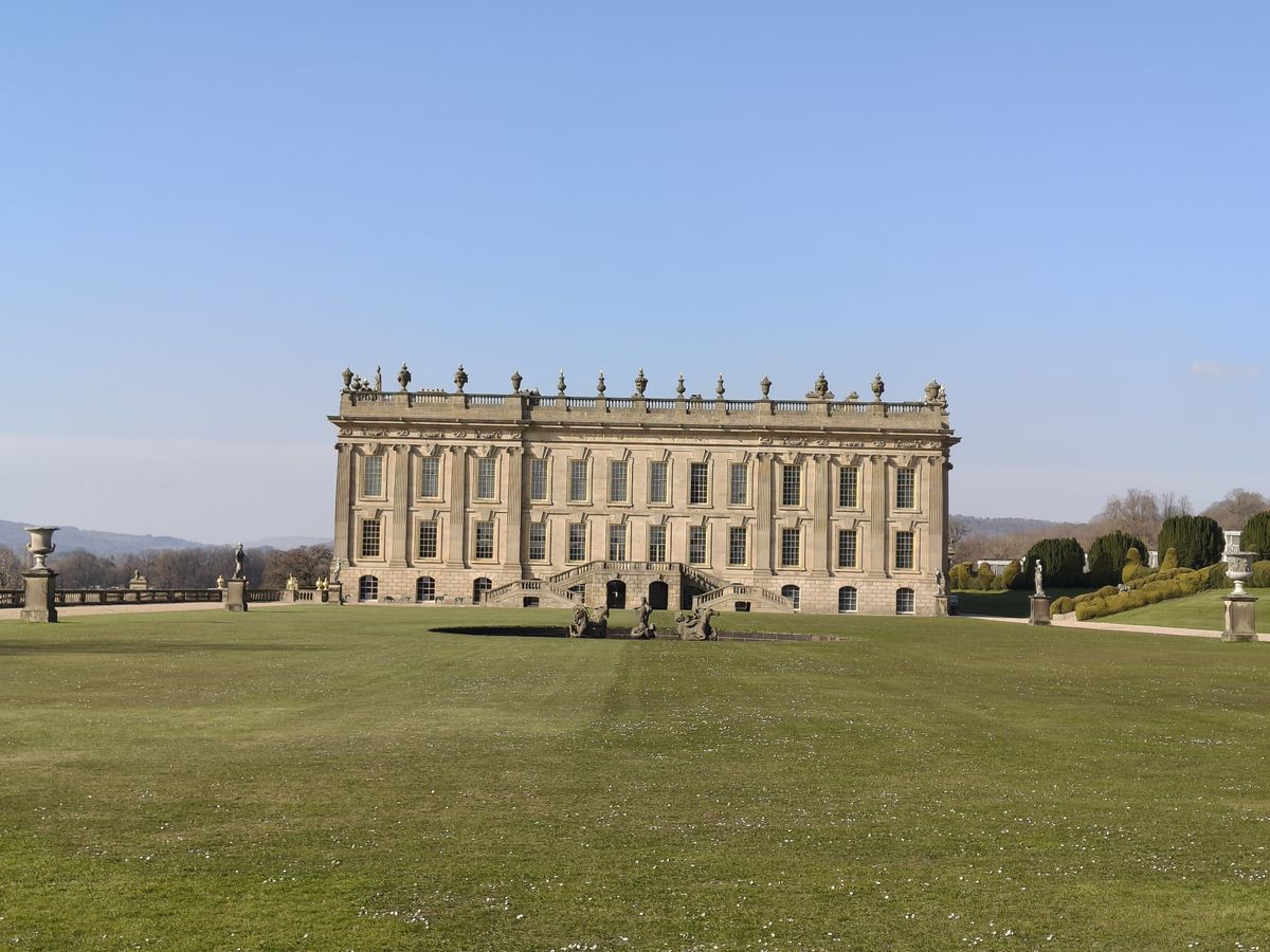 Large manor building in a green park