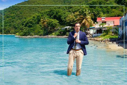Ralf Little as DI Neville Parker on the beach in Death in Paradise