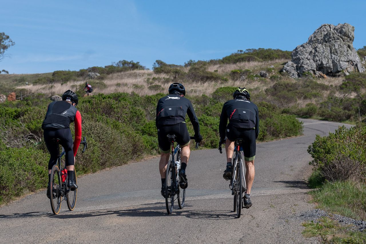 Riders head up a climb