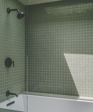 Green bathroom with mosaic square tiles