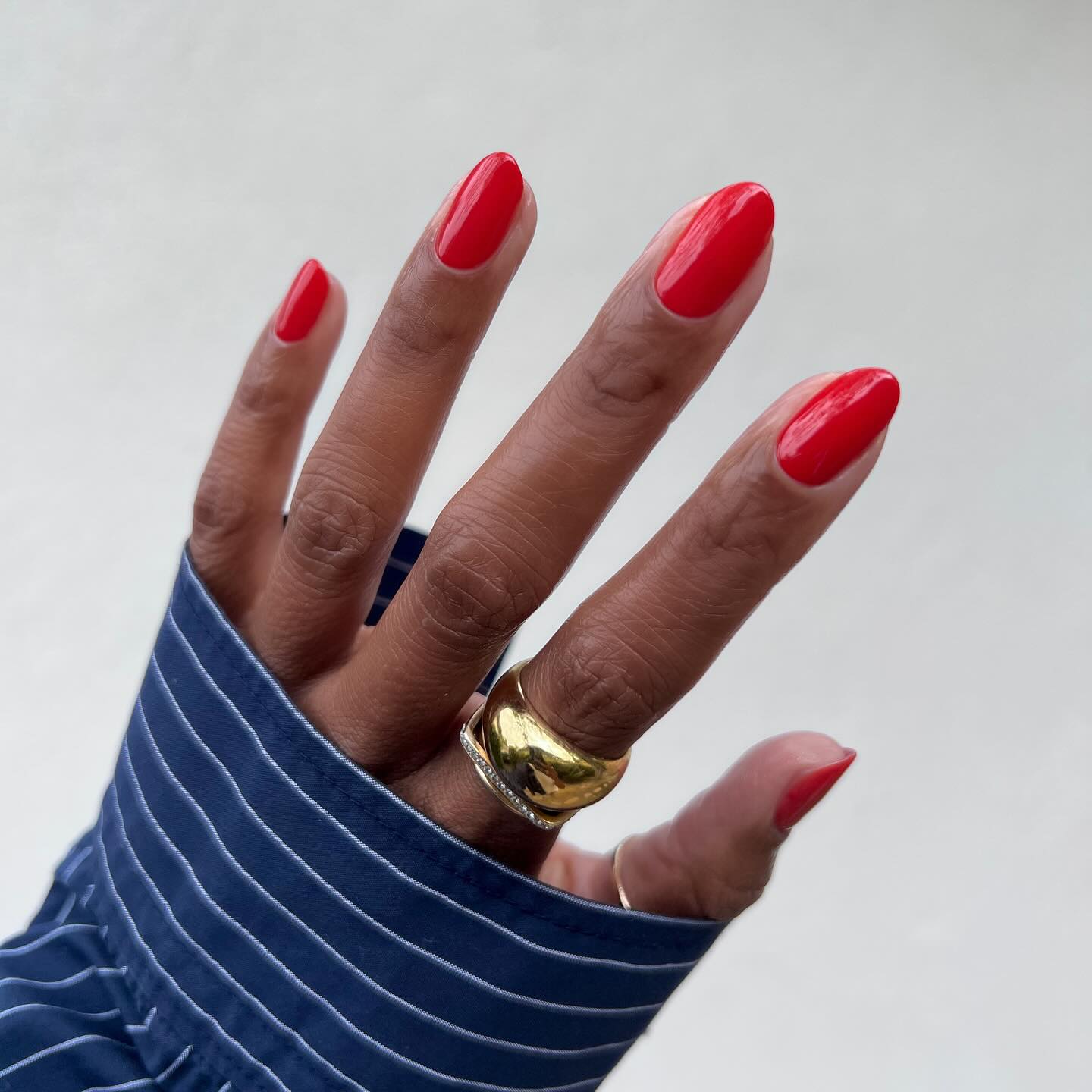 Tomato red short almond manicure
