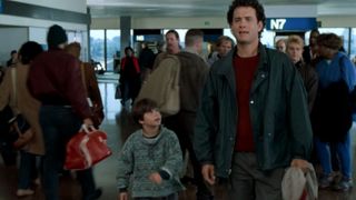 Sam and Jonah walking through the airport in Sleepless in Seattle