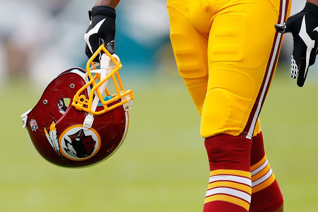 Redskins player with helmet.