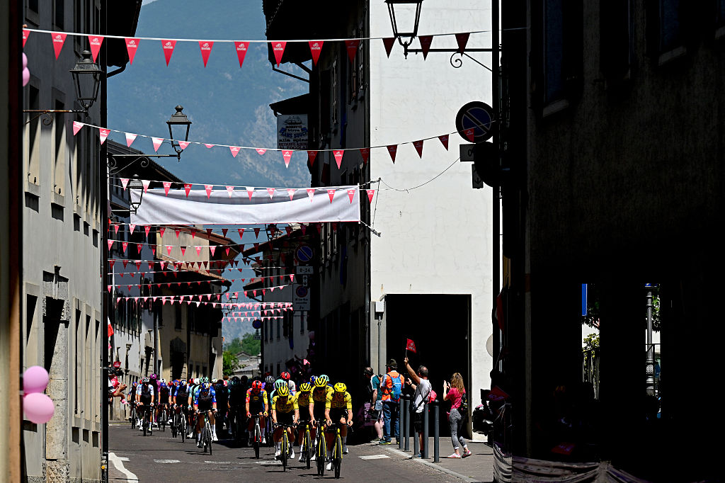 PIANCAVALLO, ITALY - MAY 30: A general view of the peloton passing through a Artegna village during the 109th Giro d&amp;amp;apos;Italia 2026, Stage 20 a 200km stage from Gemona del Friuli to Piancavallo 1289m / #UCIWT / on May 30, 2026 in Piancavallo, Italy. (Photo by Tim de Waele/Getty Images)