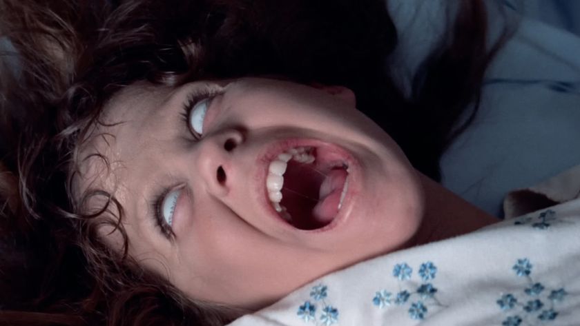 Linda Blair, as Reagan, screaming in agony as the demon takes over her body in The Exorcist (1973).
