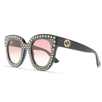 Gucci 49mm Cat Eye Sunglasses: $1,320