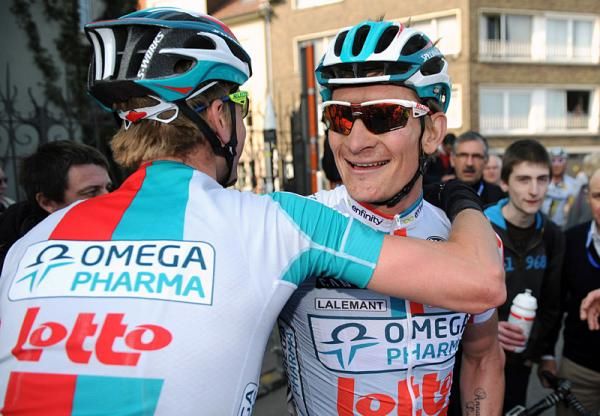 Andr&eacute; Greipel (Omega Pharma-Lotto) is congratulated by a teammate after his victory.