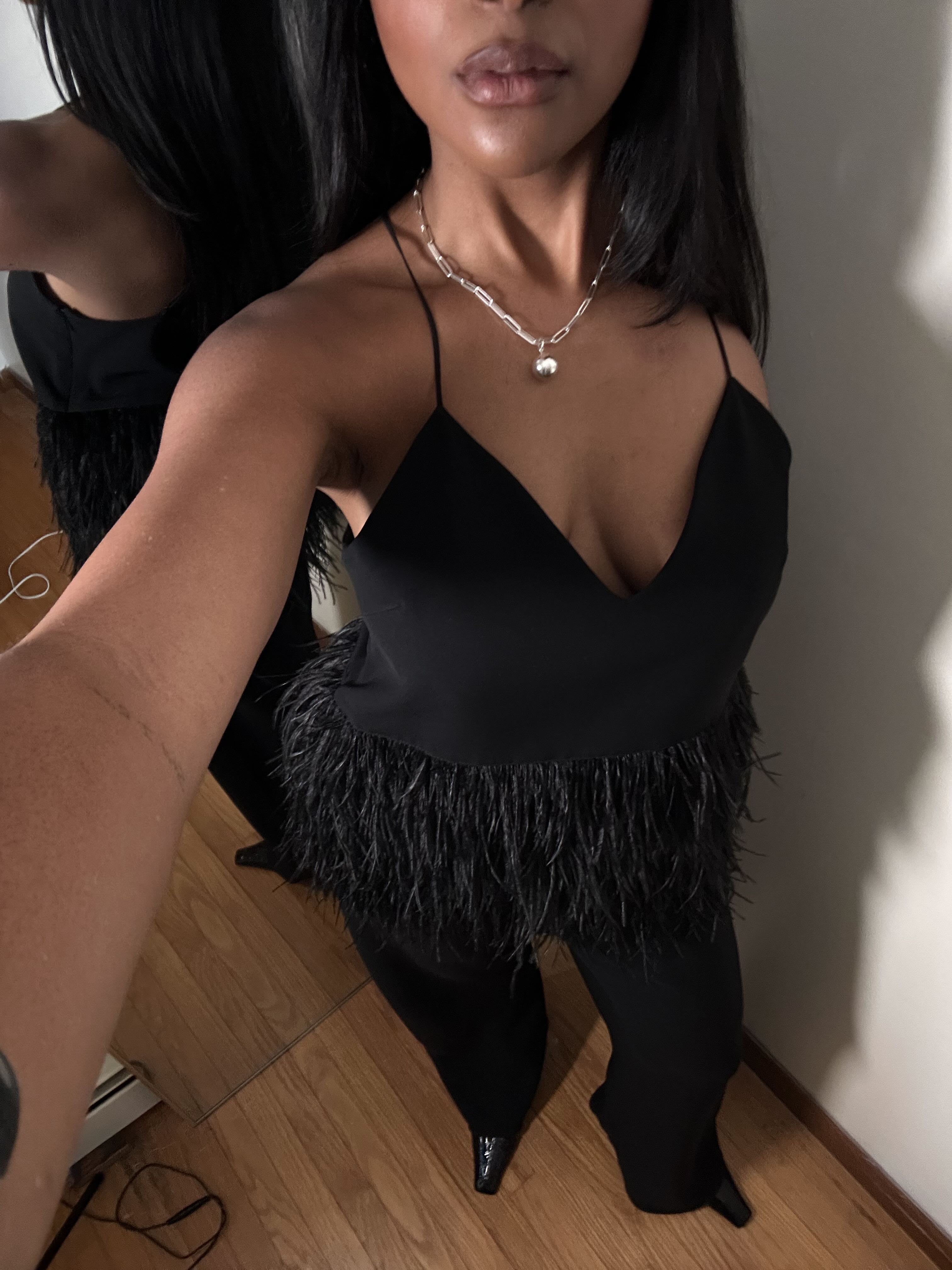 Maya Moore wearing black and white outfits