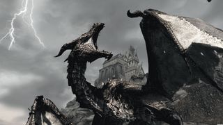 A black dragon roaring with a manor house behind it and lighting in the sky during Skyrim.