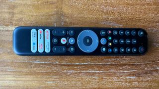 TCL C655K (55C655K) 55-inch TV remote control on wooden surface