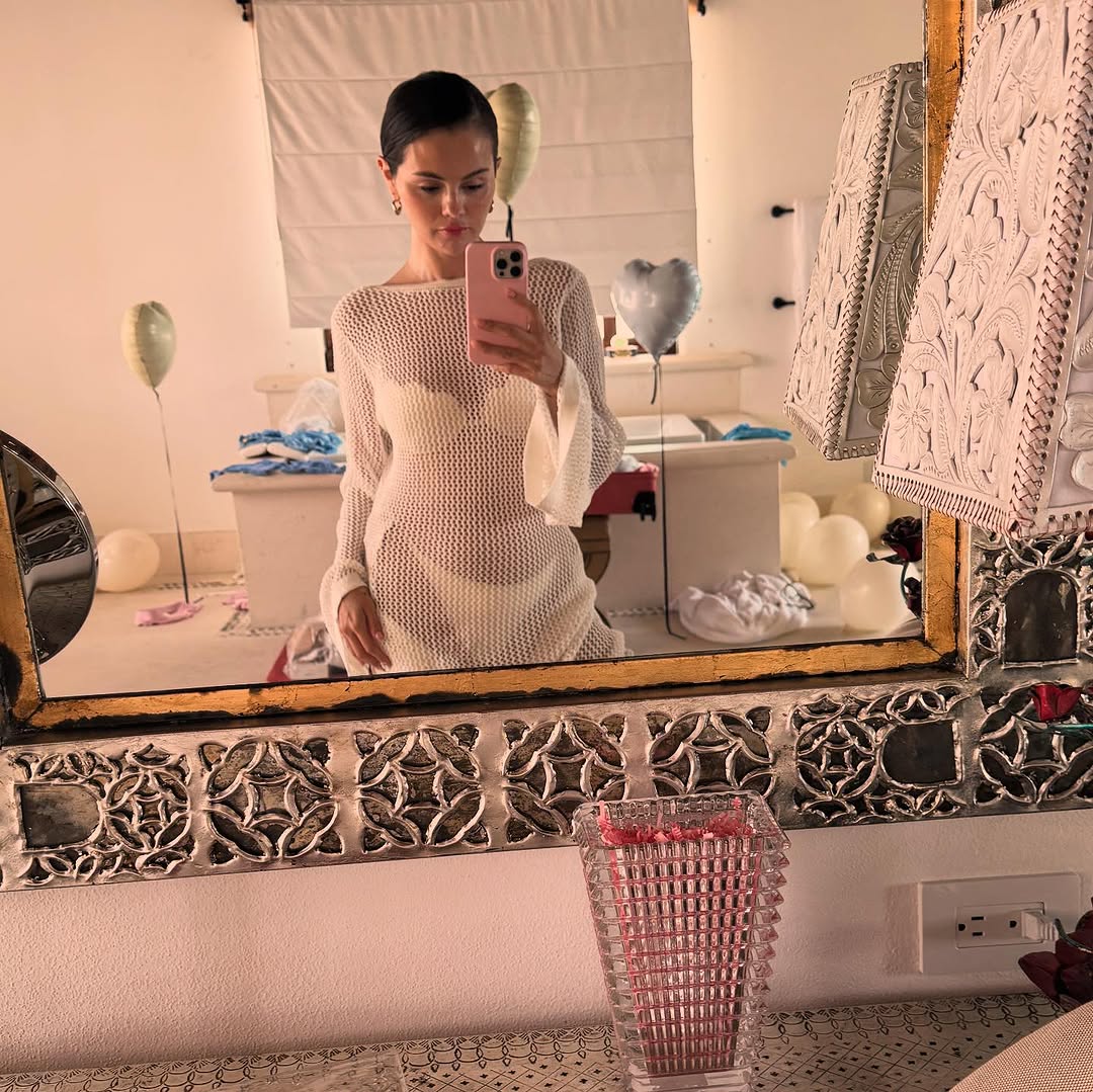 Selena Gomez posed in a white bikini and a matching cover up on her bachelorette trip