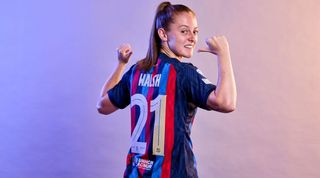 Keira Walsh posing after signing for Barcelona