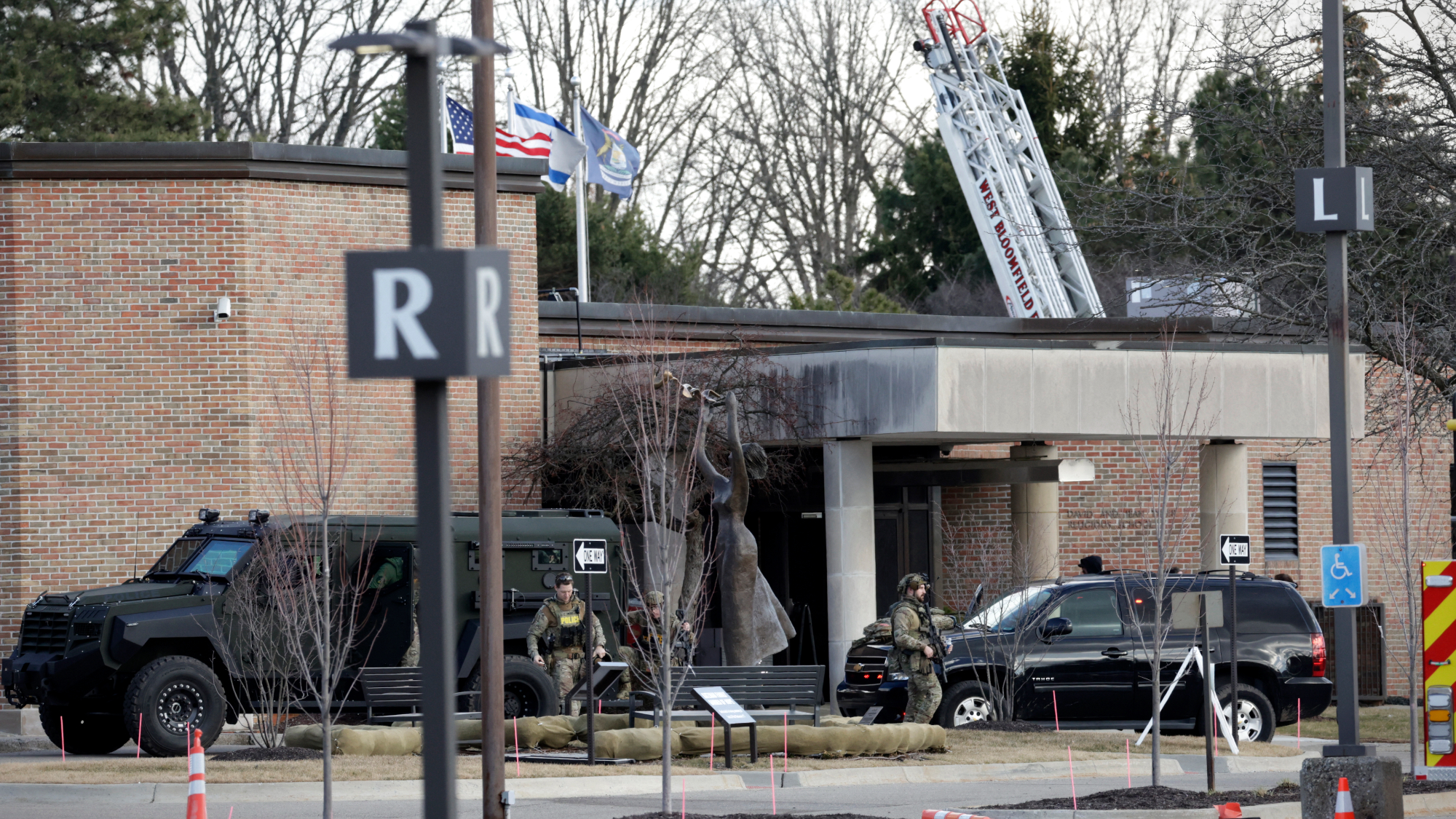 Law enforcement remain on site at the Temple Israel synagogue in West Bloomfield, Michigan