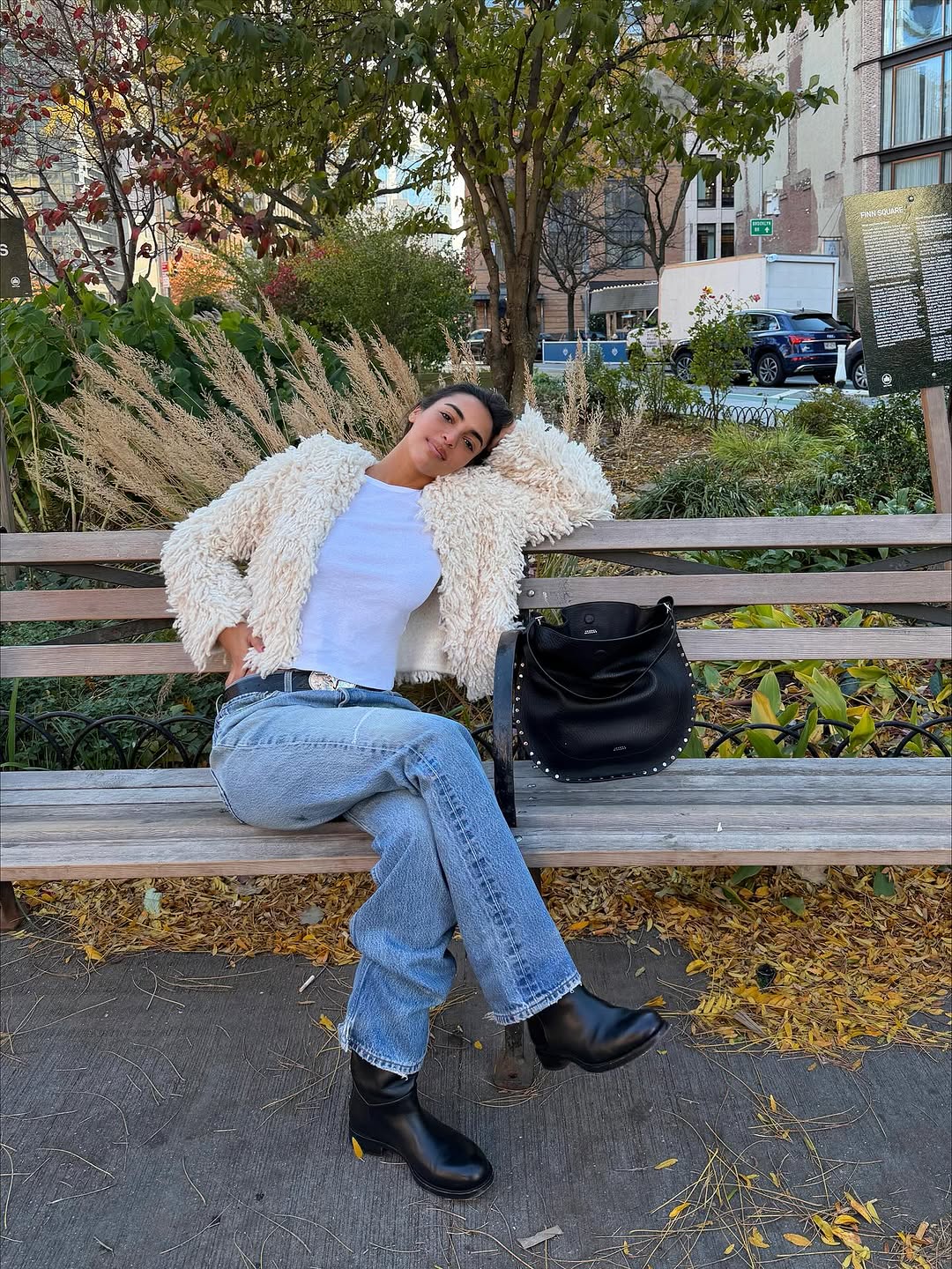 woman wearing winter to spring transitional capsule wardrobe 2026