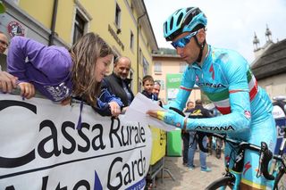 Vincenzo Nibali (Astana) signs an autograph for a fan.