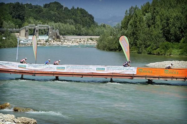 Racers cross a bridge