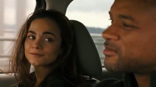 Alice Braga smiles at Will Smith on a car ride in I Am Legend.